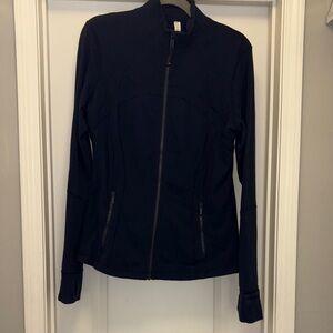 Lululemon Athletica navy
Luon Define
Size 12
Zipup jacket
Thumb holes 
Pockets